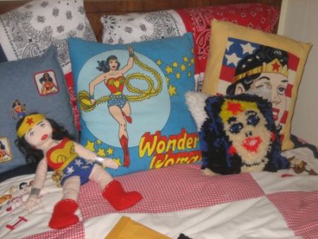 at least he's not in denial about the whole thing bedroom decorated with Wonder Woman memorabilia
