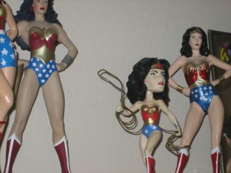 under the lash of addiction collection of Wonder Woman figurines