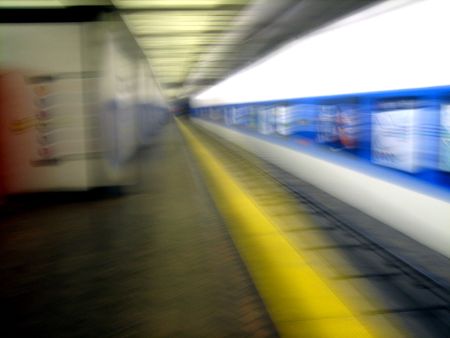 is this the right one? or is it going the wrong way? out of focus shot of a train arriving