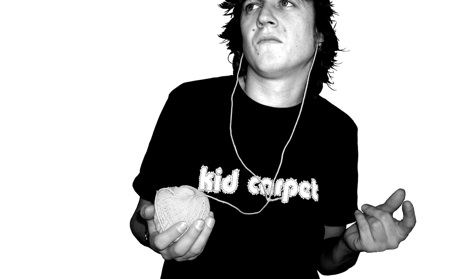 he's not listening and he's tuned into something else kid carpet listens to a ball of yarn