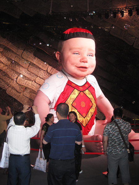 a face only a mother could love Giant Baby Robot being admired at the Shanghai Worlds Fair