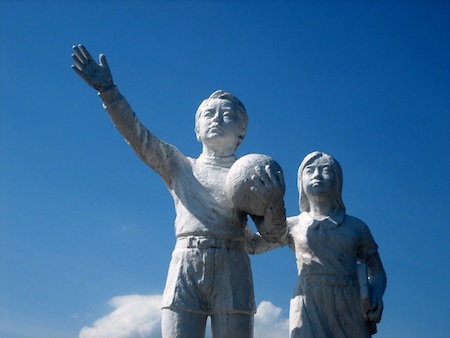 onward past the zombies and the vampires! a statue of two children